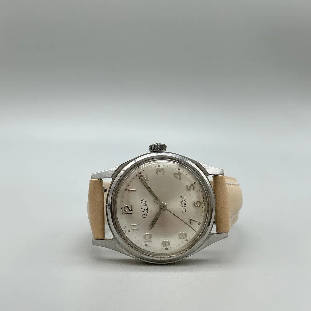 Vintage Avia Cadet Mens Watch 29mm Silver Tone Beige Leather Manual Wind